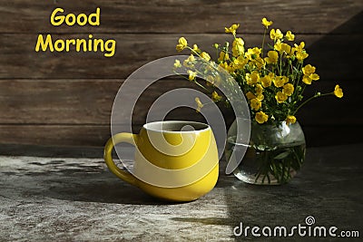 Still life with cup of coffe and yellow flowers and text Stock Photo