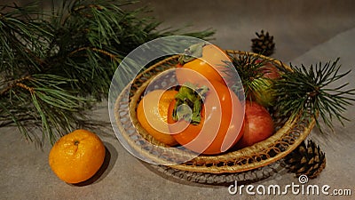 Still life with fruit and pine branch Stock Photo