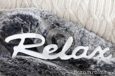 Still Life With Fur And Word Relax Stock Photo