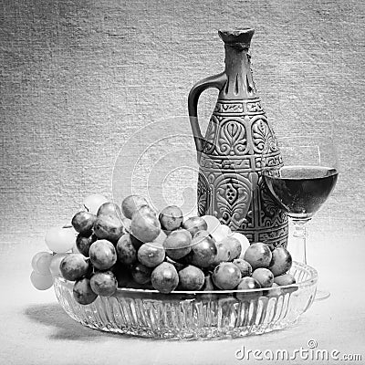 Still-life from grapes, bottle and glass of wine Stock Photo