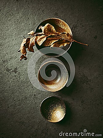 Still life with hand crafted japanese ceramic on stone background Stock Photo