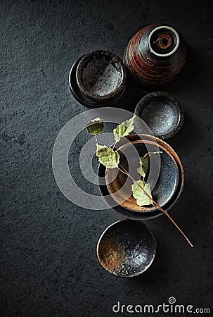 Still life with hand crafted japanese ceramic on stone background Stock Photo