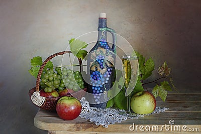 Harvested crop: apples, grapes on a brown background. Stock Photo