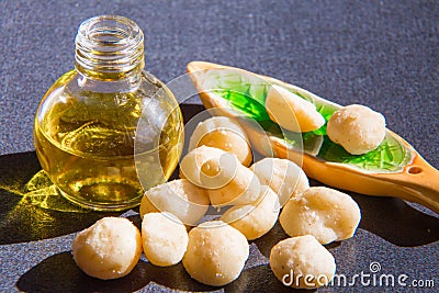 Still life with Macadamia oil in the bottle and Stock Photo