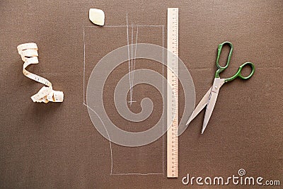 Still life photo of a suit pattern template with tape measure, c Stock Photo