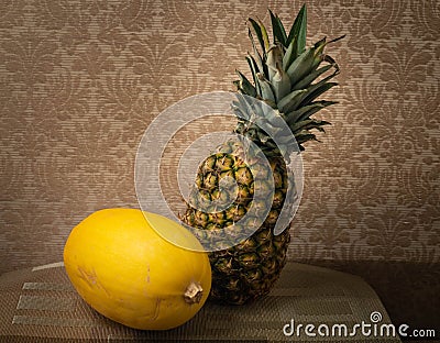 Still Life of a Pineapple and Squash Stock Photo