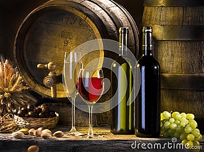 The still life with red wine and barrels Stock Photo