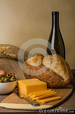 Still life with sausage cheese and bread Stock Photo