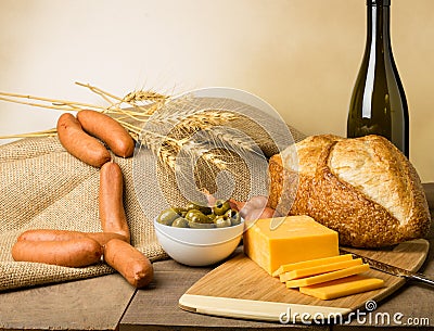 Still life with sausage cheese and bread Stock Photo