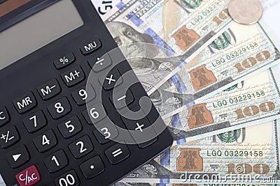 Still life scene dollar currency and calculator Stock Photo