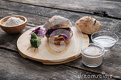 Still life setting with home made delicious vegan burger Stock Photo