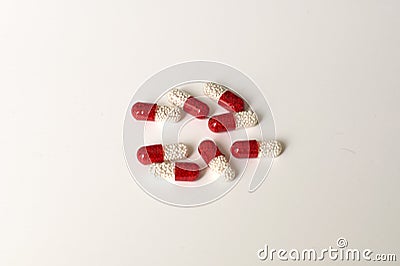 A still life shot of red and white prescription medicines Stock Photo