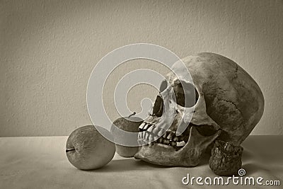 Still life with skull man with apples Stock Photo