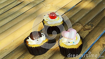 Still life sweet and dessert food with cup cake on bamboo backgrounds Stock Photo