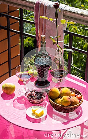 Still life on the veranda a light lunch with wine in the summer afternoon, in the south of Russia. Wine tasting. Stock Photo