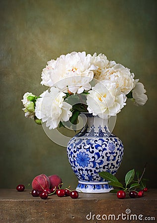 Still life with white peonies in a chinese vase Stock Photo