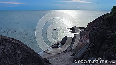 stillness of the sea and the light that hits the stone Stock Photo