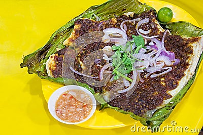 Stingray Fish with Sambal Chili Sauce Stock Photo