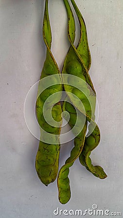 Stinky beans or petai in white background Stock Photo