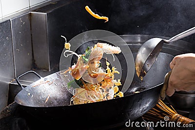 Stir fire cooking Stock Photo