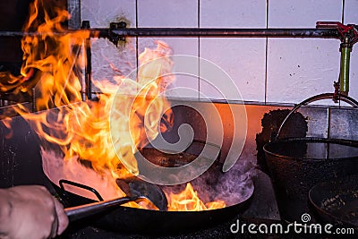 Stir fire cooking Stock Photo