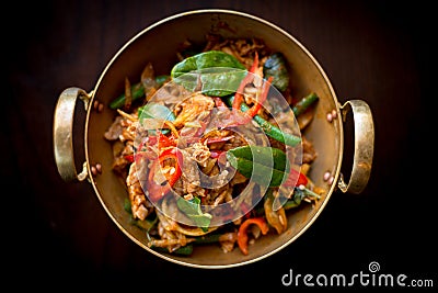 Stir fried chicken with Thai herbs. Stock Photo