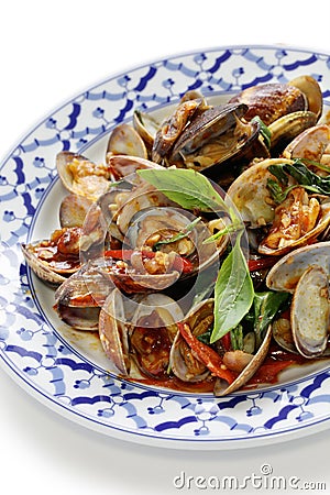 Stir fried clams with thai sweet basil Stock Photo