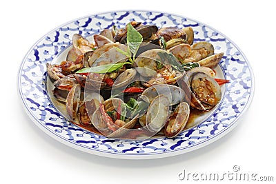 Stir fried clams with thai sweet basil Stock Photo