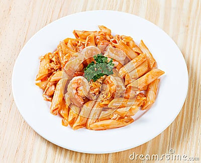 Stir fried macaroni and prawn with tomato sauce Stock Photo