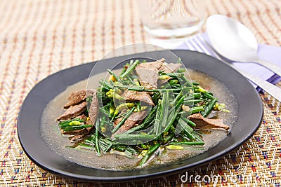 Stir fried pork liver with vegetable Stock Photo