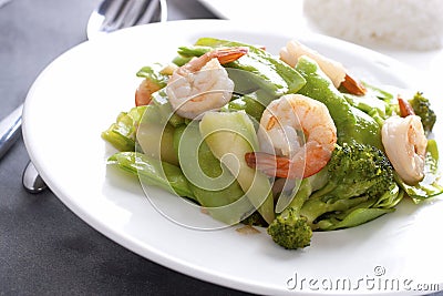 Stir fried snow peas with shrimp. Stock Photo