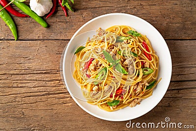 Stir fried spicy spaghetti with minced chicken and basil,Pad Kra Pao Stock Photo