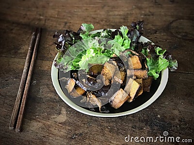 Stir-fried tofu and shiitake mushrooms Stock Photo