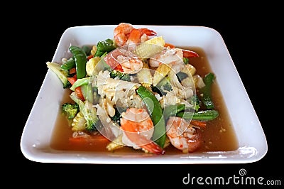 Stir fry mixed vegetables and shrimp in white dish Stock Photo