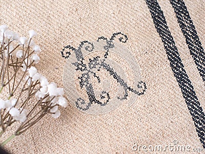 Stitched monogram K, grain sacks Stock Photo