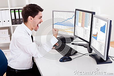 Stock broker trading in a bull market Stock Photo