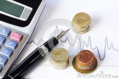 Stock chart and coins Stock Photo