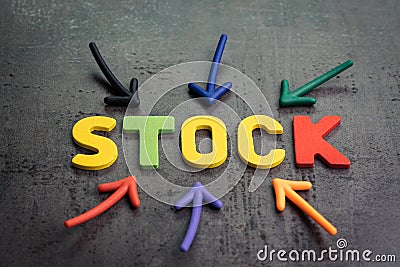 Stock or equity market, investment asset concept, arrows pointing to the center with colorful letters building the word STOCK Stock Photo