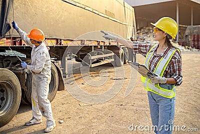 Stock keeper girl Currently using the product tablet Before exporting for sale Stock Photo