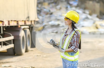 Stock keeper girl Currently using the product tablet Before exporting for sale Stock Photo