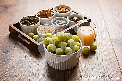 Amla or avla juice, pickle, supari, murabba, chyawanprash Stock Photo