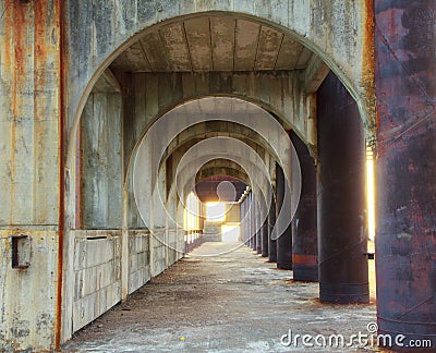 Stock Photo - corridor of concrete pillars with perspective dept Stock Photo