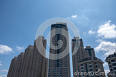Symmetrical View of Concrete Skyscrapers Stock Photo
