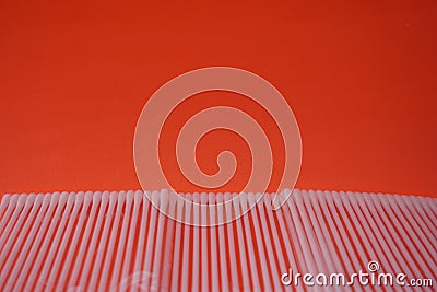 Stock photo of 3 stacks of white cotton buds that are lined up and neatly arranged so that they look aesthetic. Stock Photo