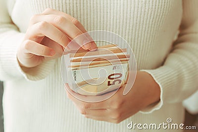 Stock photo of some hands counting money Stock Photo