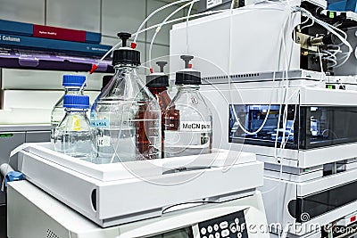 Stock solutions for a purpose of liquid chromatography analysis, bottles are connected directly to the LC machine Stock Photo