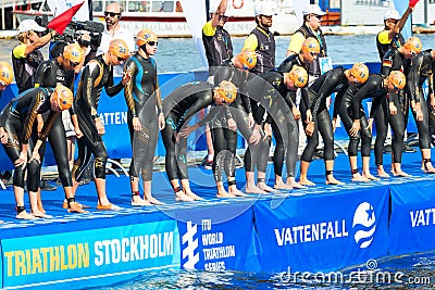 STOCKHOLM - AUG, 24: Just before the start and the triathletes i Editorial Stock Photo