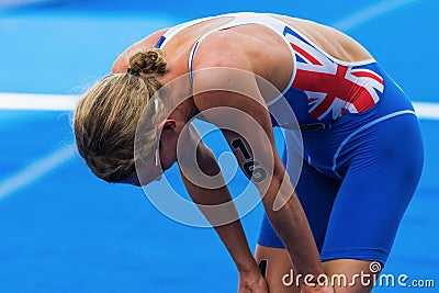 STOCKHOLM - AUG, 24: Katie Hewison (GBR) taking the breath after Editorial Stock Photo