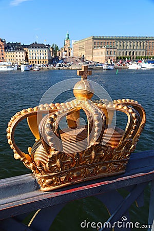 Stockholm city golden crown on Skeppsholmsbron Stock Photo