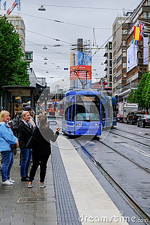 Stockholm,Sweden People waiting for the tram Editorial Stock Photo